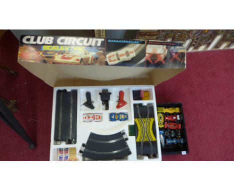 A Scalextric set and various cars - Club Circuit, six Formula One and one Mini
