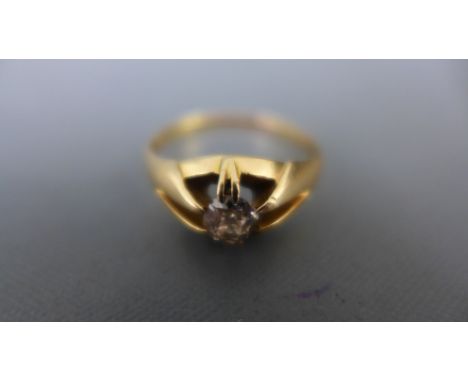 A presumed 18ct yellow gold ring with single diamond to shoulder, size of diamond approx 0.25ct - ring size R - approx weight