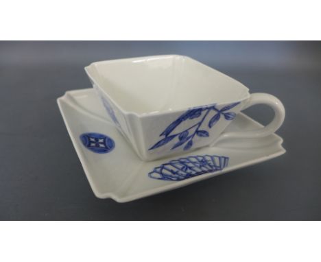 An antique Worcester rare diamond shaped blue and white tea cup and saucer - no damage evident