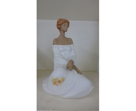 A Lladro Sunset model no 2404 - Girl sitting with roses - boxed, in good condition