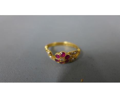 An 18ct yellow gold pearl, ruby and diamond ring approx 2.6 grams - ring size N - part of shoulder missing