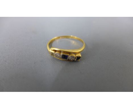 An 18ct yellow gold diamond and sapphire ring - approx weight 2 grams - ring size L - heavy usage wear, part of surround to o