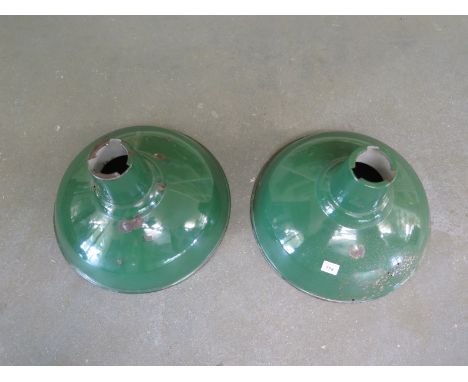 A pair of green metal industrial light shades both with corrosion - Diameter 40cm