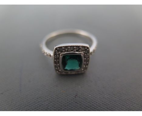 An Art Deco design 9ct white gold emerald and diamond ring size M - approx 2.5 grams - clean and bright