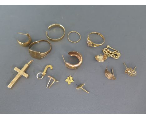 A selection of 9ct yellow gold items including rings, earrings, crucifix etc - ring cut