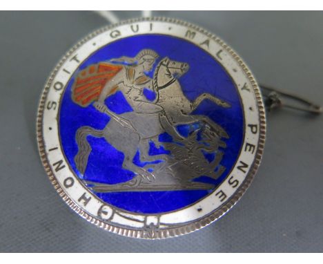 An enamel Crown coin brooch un dated