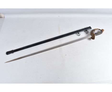 A WW1 ERA IMPERIAL GERMAN FORCES OFFICERS SWORD, the sword has the crisp markings of the maker Weyersberb Kirschbaum &amp; Cl