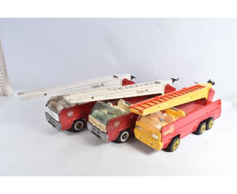 THREE TONKA TOYS AERIAL LADDER FIRE TRUCKS, all ladders raise and lower, one with working extension ladders, one with jammed 