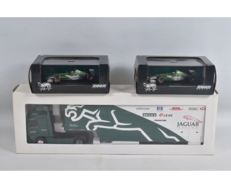 THREE BOXED DIECAST 1:43 SCALE MODEL VEHICLES, TO INCLUDE a Eligor Volvo FH Jaguar F1 Team truck 2000, model number 111847, a