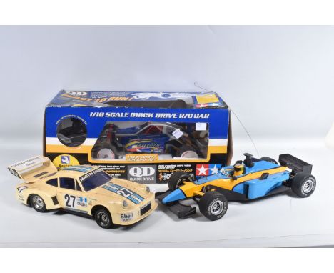 A BOXED TAMIYA 'BAJA KING' 1/10 SCALE QUICK DRIVE RADIO CONTROL CAR, not tested, appears largely complete and in very good co