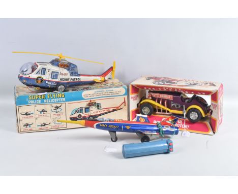 A BOXED T.P.S. JAPAN BATTERY OPERATED TINPLATE SUPER FLYING POLICE HELICOPTER, No.9094, not tested, appears complete and in g