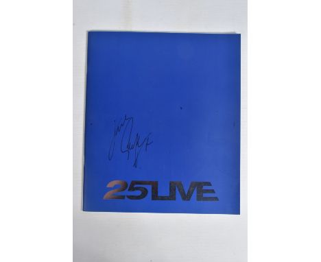 A SIGNED 25LIVE GEORGE MICHAEL PROGRAMME, 35cm x 30cm, signed to the front blue panel