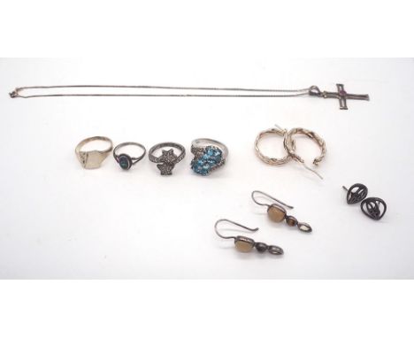Mixed lot hallmarked 925 silver,
cross pendant on a 16inch chain,
3 pairs of silver earrings,
ring with blue stone size N,
st