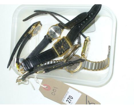 6 assorted wristwatches including Timex and Gucci each with a leather strap.