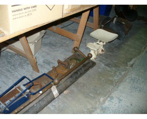 A Copper pierced fender, flat irons, vintage scales, copper caol helmets, a pair of 19th century trap lamps, etc.