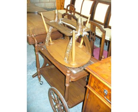 A Modern brass inlaid hardwood serving trolley , a camel saddle stool and an Ercol elm kidney shaped occasional table. (3)