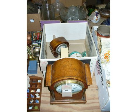 An Early 20th century oak cased mantel clock with a white enamelled dial, 2 train movement, a 1940's walnut cased mantel cloc