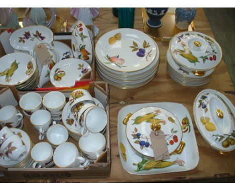 A Qty of Royal Worcester " Evesham " table wares including dinner plates , cups , saucers, tureens and casserole dishes, etc.