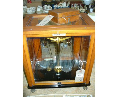 A Cased set of " L Gertling Ltd , London " scientific balance scales , model No. 48 c/w with cased miniature brass weights.