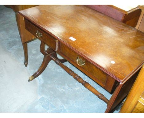 A Reproduction burr walnut sofa table with 2 frieze drawers.