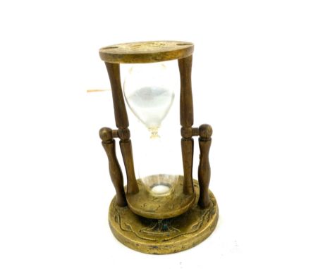 Vintage brass egg timer measures approx 4 inches tall