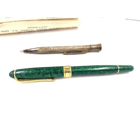 Vintage Eversharp silver pencil with paperwork and a Pierce Fanles fountain pen 