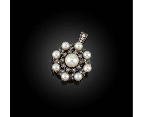 A late 19th century pearl and diamond pendant, the matched button pearls set within diamond trefoils in silver and gold, late