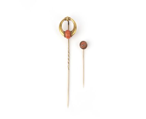 λ Two coral stick pins, mid 19th century, the first stick pin designed in the Archaeological Revival style, designed as a hin