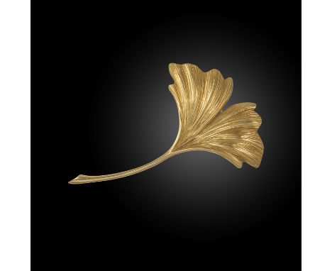 Mauboussin, a gold ginkgo leaf brooch, in textured and plain yellow gold, signed, with French control marks and maker's lozen