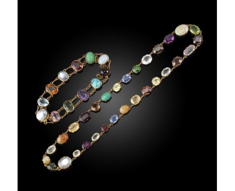 An Edwardian multi gem-set riviere necklace, the oval stones include topaz, peridot, citrine, sapphire, moonstone, garnet, tu