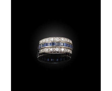 A sapphire ruby and diamond half hoop ring, the central band set with rubies and sapphires each covering half the ring, with 