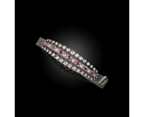 A ruby and diamond bracelet, early 20th Century, the front set with circular-cut rubies and diamonds, to a white gold mesh br