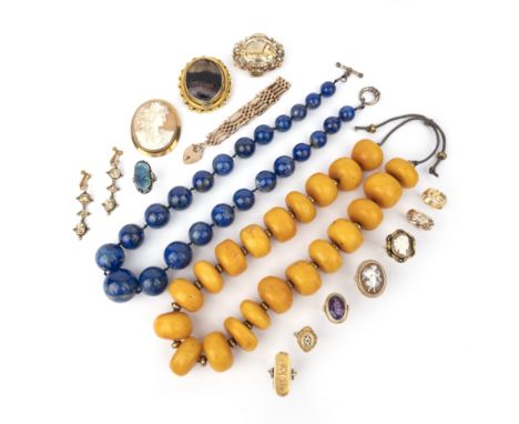 A collection of jewellery, including: a silver and black opal ring (opal broken); an amber bead necklace; a lapis lazuli bead