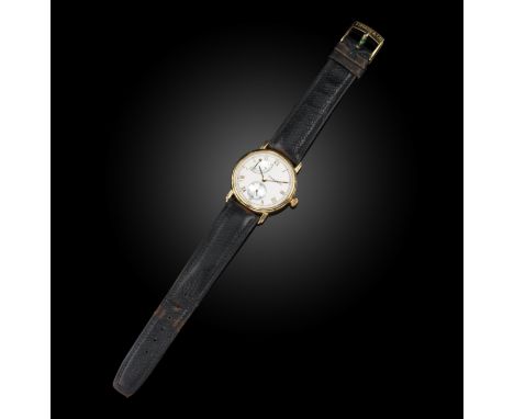 Tiffany &amp; Co., an 18ct gold wristwatch, 'M263', the white enamel dial with gold Roman numeral indicators and hands, with 