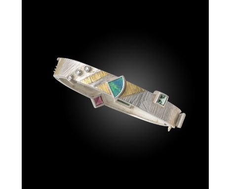 Dan Alsberg, a modernist tourmaline, opal and diamond bangle, the hinged textured bangle of Cubist-inspired design, collet-se