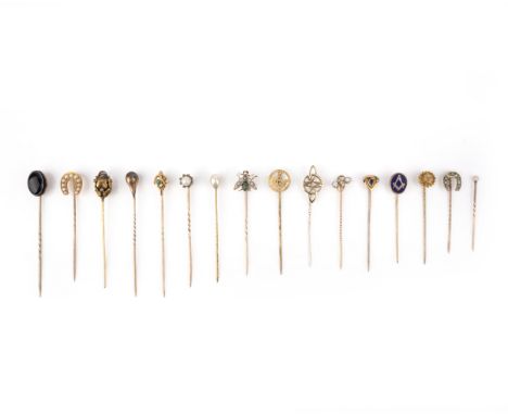 A collection of sixteen stick pins, late 19th and 20th century, comprising: two stick pins set with turquoise and seed pearls