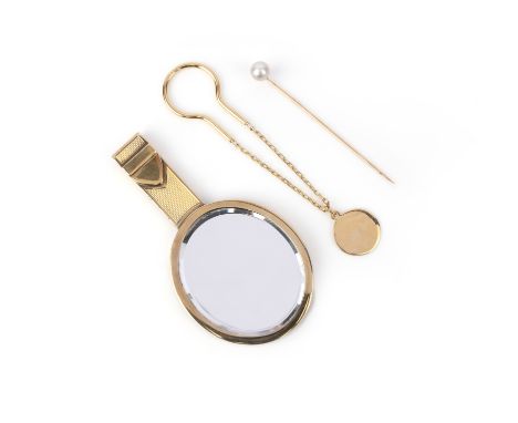 A Cartier keyfob, a hand mirror by Hermès, and a pearl stick pin, comprising: a gold key fob by Cartier, suspending a disc pe
