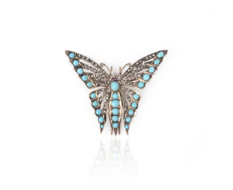 A turquoise, ruby and diamond brooch, designed as a butterfly, set with turquoise cabochons and rose-cut diamonds, its eyes s