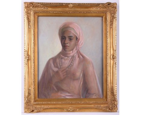 French school pastel drawing on artist's board depicting a portrait of a woman veiled in pink, clutching a large beaded neckl