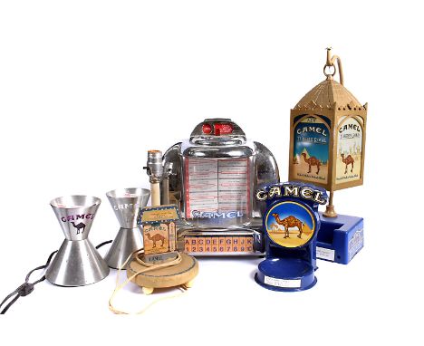 A Camel Radio, in the form of an American Jukebox, together with a pair of brushed chrome lamps, another lamp in the form of 