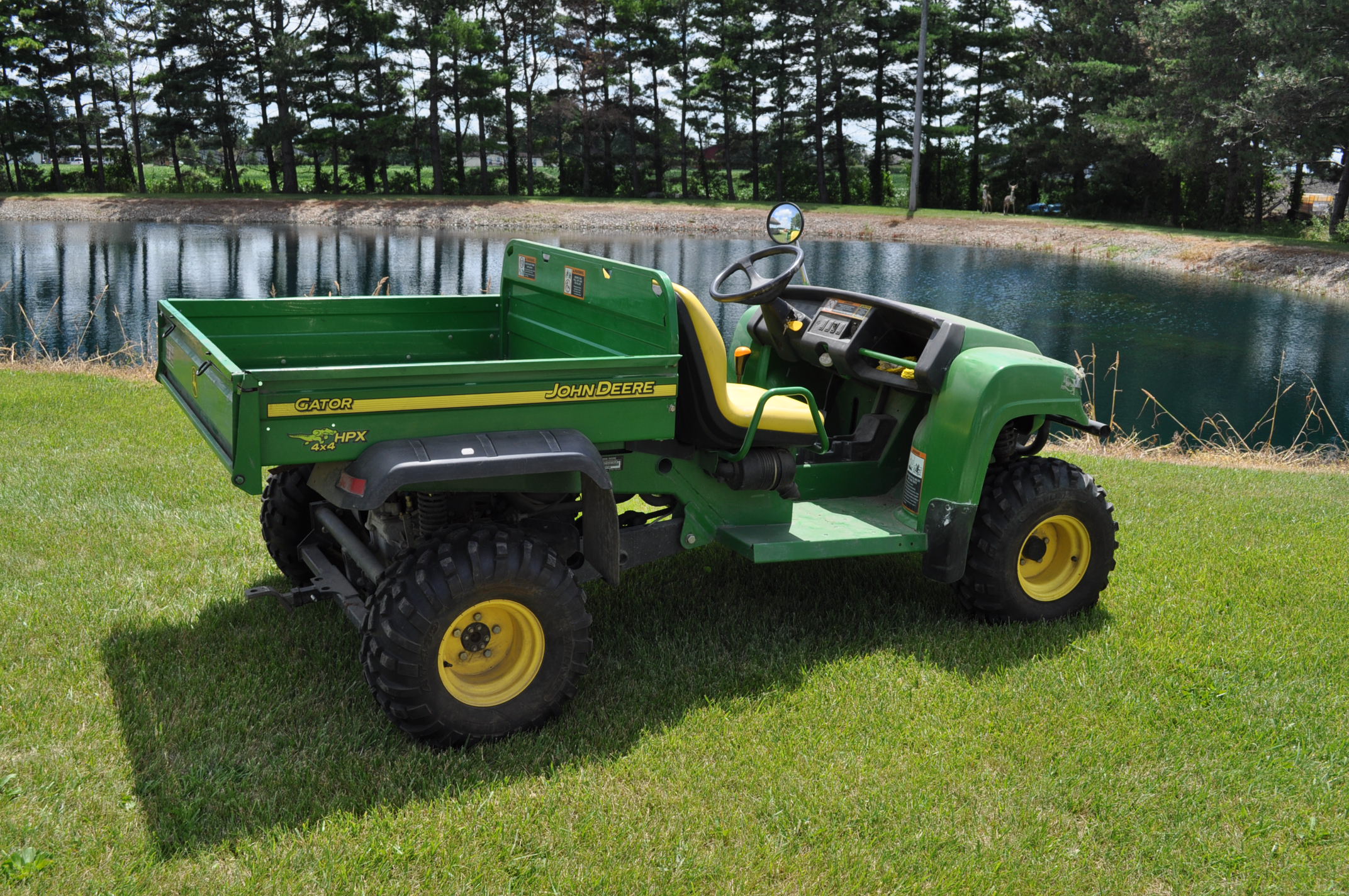 John Deere Gator HPX, 4x4, manual dump bed, 225 hrsClose FarmsBellevue