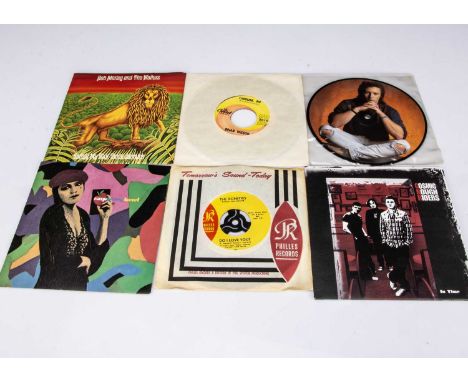 7" Singles, more than four hundred singles of various genres with artists including Prince, John Lennon, Cosmic Rough Riders,
