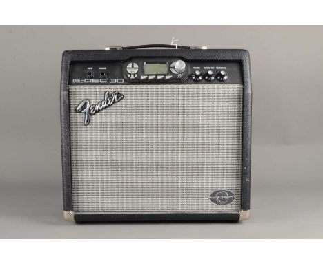 Fender Amplifier / Footswitch, a Fender G-Dec 30 Amp with manual and power lead together with a Fender MGT4 Footswitch with p