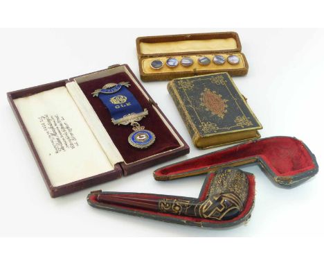 Silver Masonic medal, book of common, pryer cased pipe Unfortunately we cannot do condition reports for this sale.