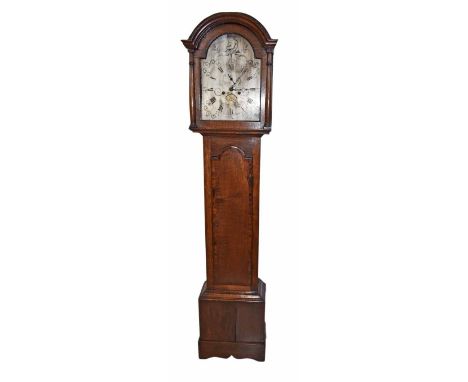 A short 19th century oak longcase clock. Later case with semi-circular arched pediment and long door on box base with gullwin