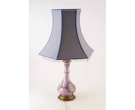 Late 19th century electric table lamp. The ceramic base is painted with posies of flowers on a lilac background. With tulip s