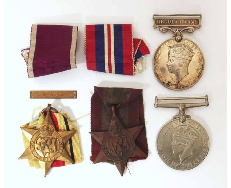 WWII medal group awarded to 1057103 SJT.C.A Herriott R.A to include army long service and good conduct medal with regular arm