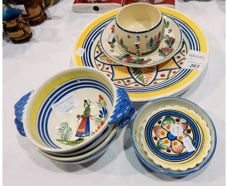 Pair Quimper pottery two-handled bowls, figure painted, Quimper pottery cup and saucer, two similar plates, two trinket dishe