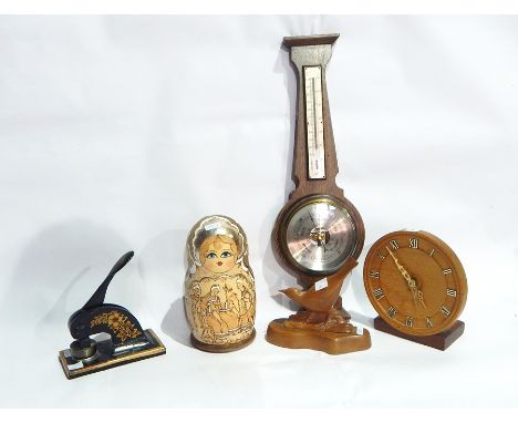 Late 19th/early 20th century cast-iron die stamp, oak mantel clock, oak banjo barometer and carved bird model 