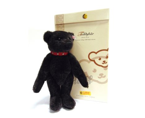 A STEIFF COLLECTOR'S TEDDY BEAR  black, limited edition 2419/3000, with certificate of authenticity, 32cm high, boxed.     